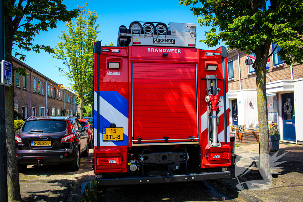 Brand onder overkapping geblust