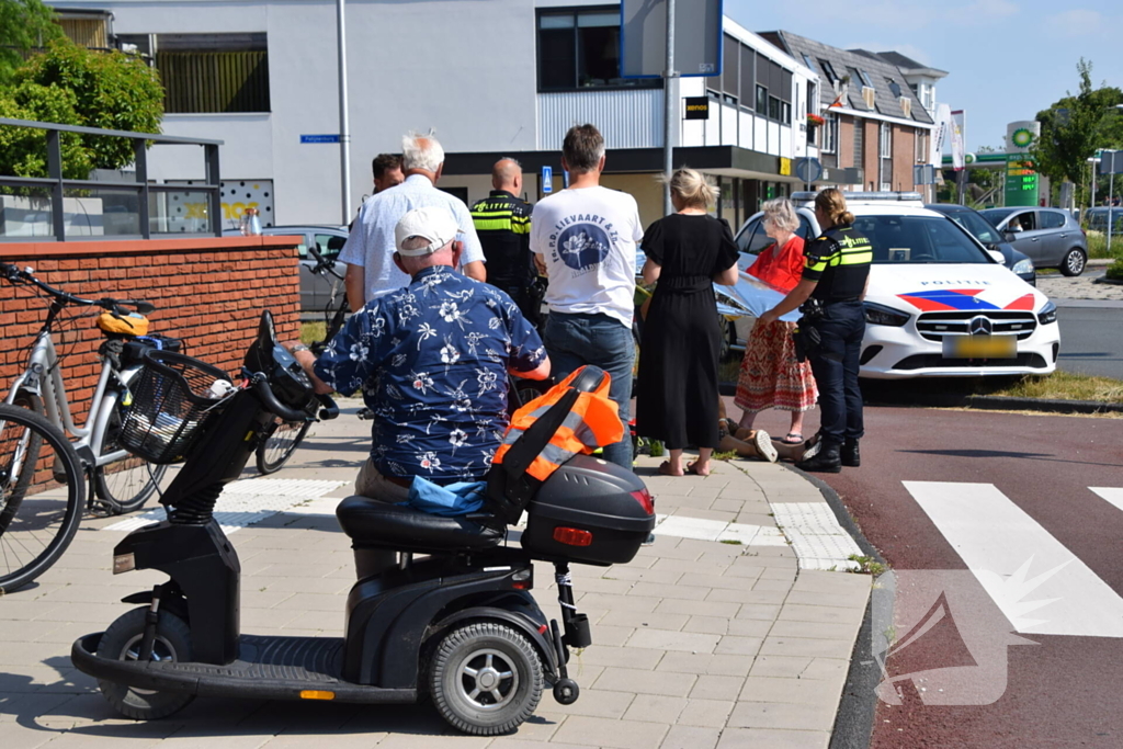 Fietsster gewond bij botsing met scootmobieler