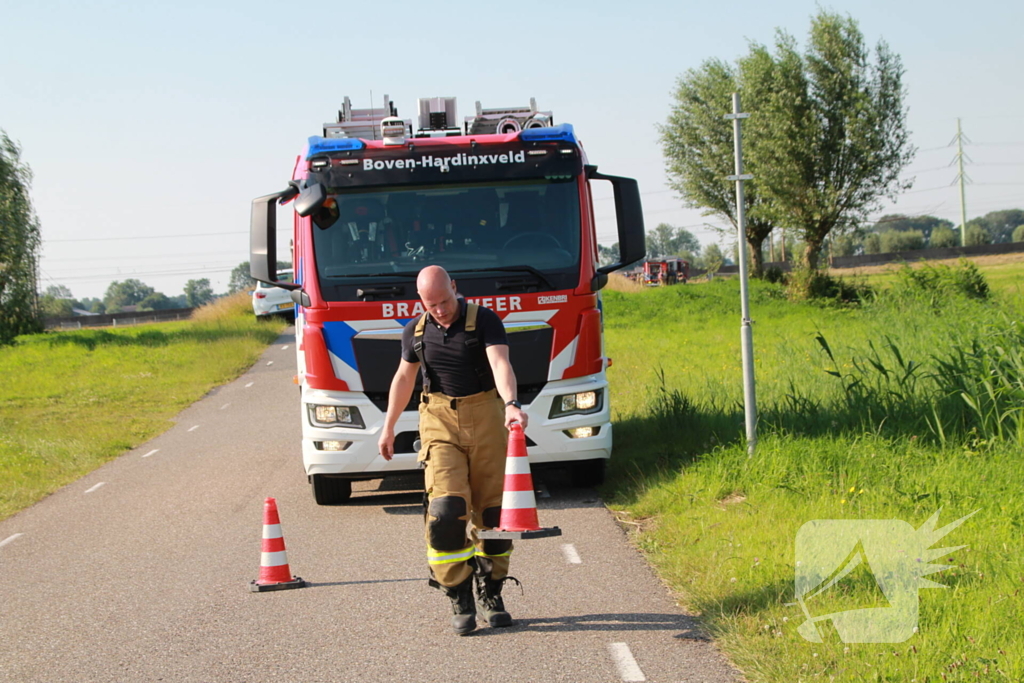 Middelbrand na bermbrand langs spoor