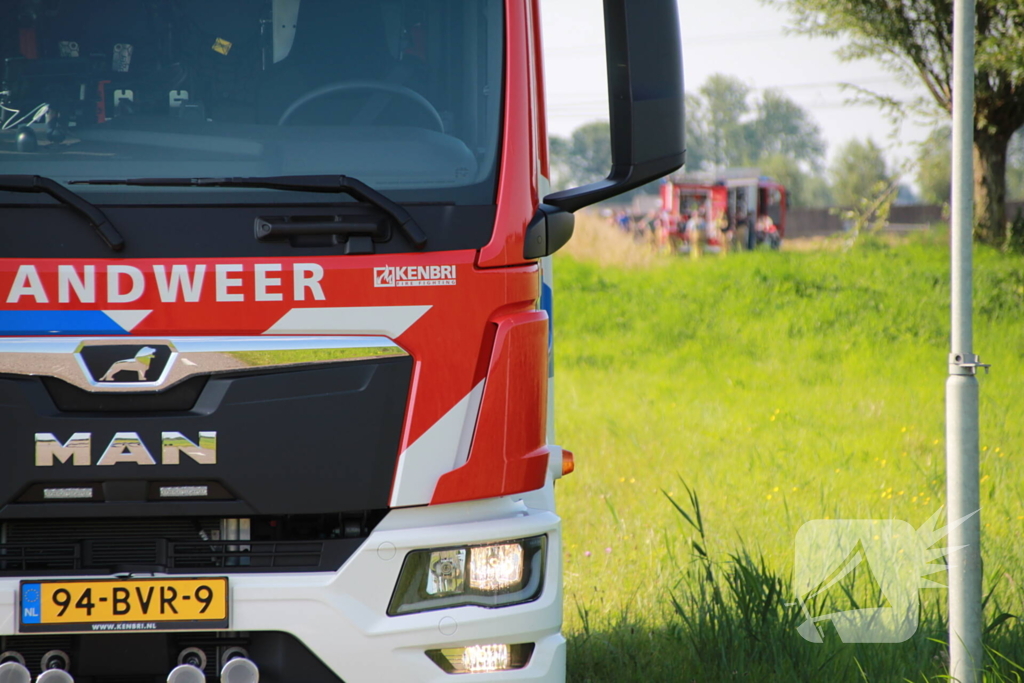 Middelbrand na bermbrand langs spoor