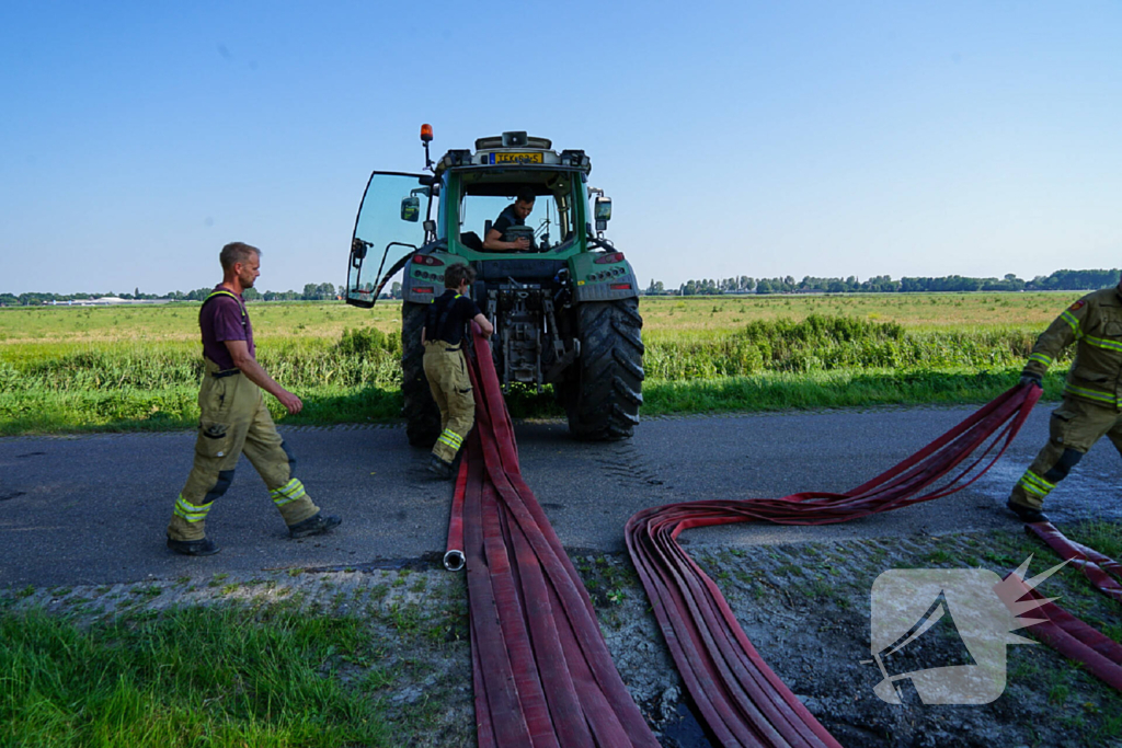 Grote rookwolken door brand in tractor