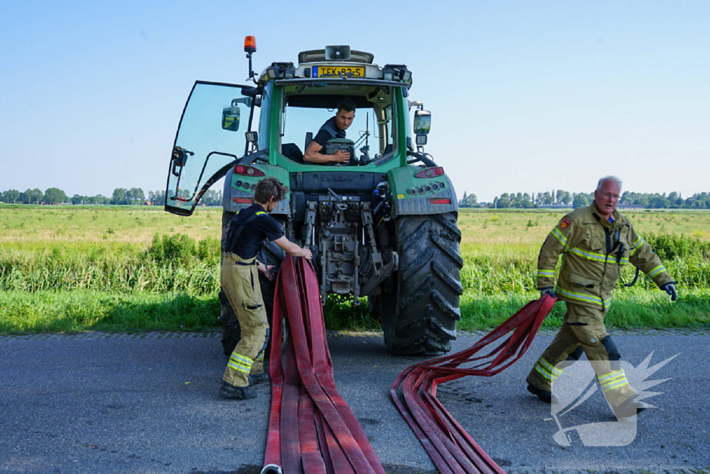 Grote rookwolken door brand in tractor