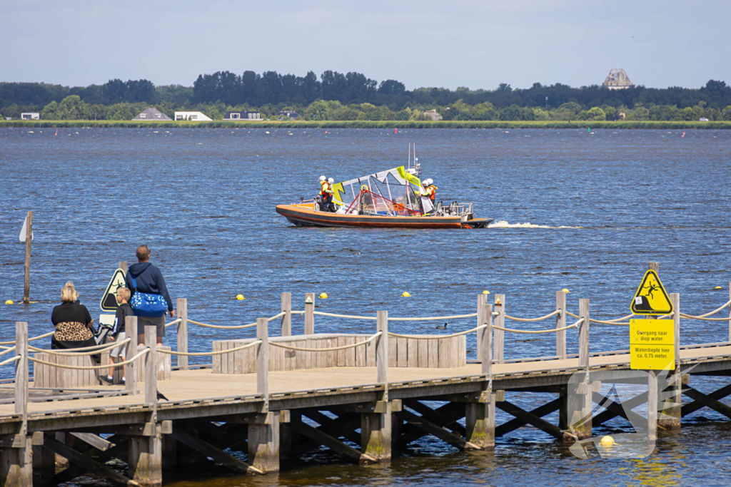 Drie jonge surfers gered op het Gooimeer