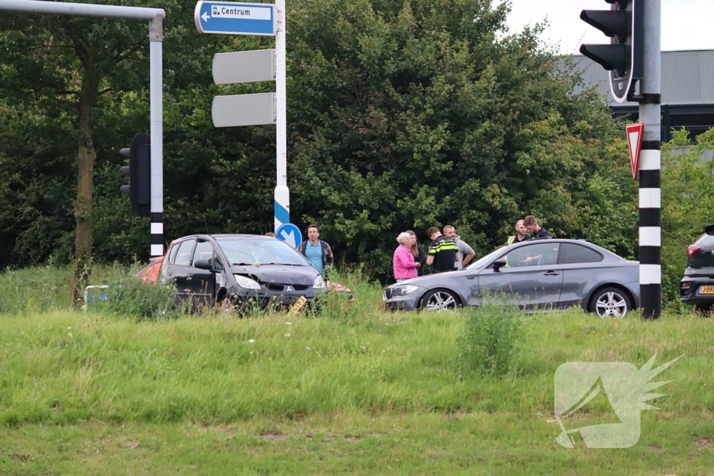 Schade na botsing op kruising