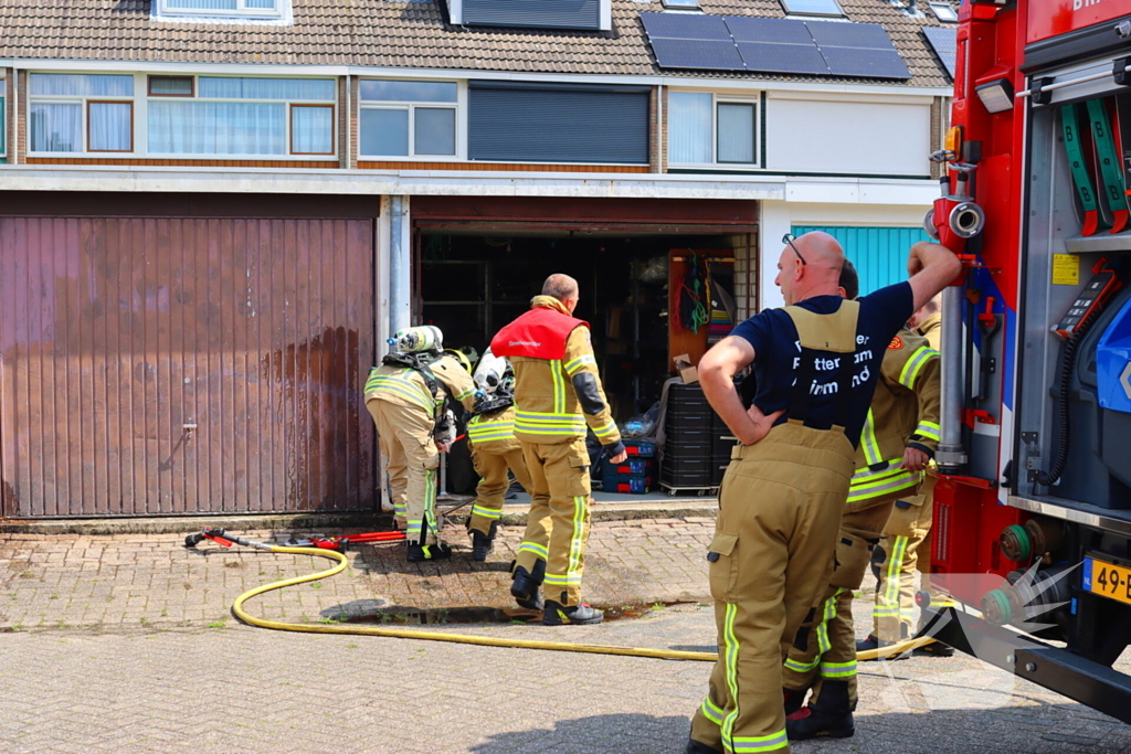 Brand in garage door laswerkzaamheden