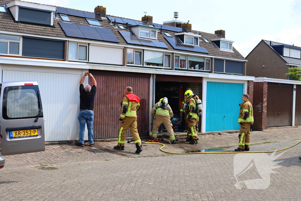 Brand in garage door laswerkzaamheden