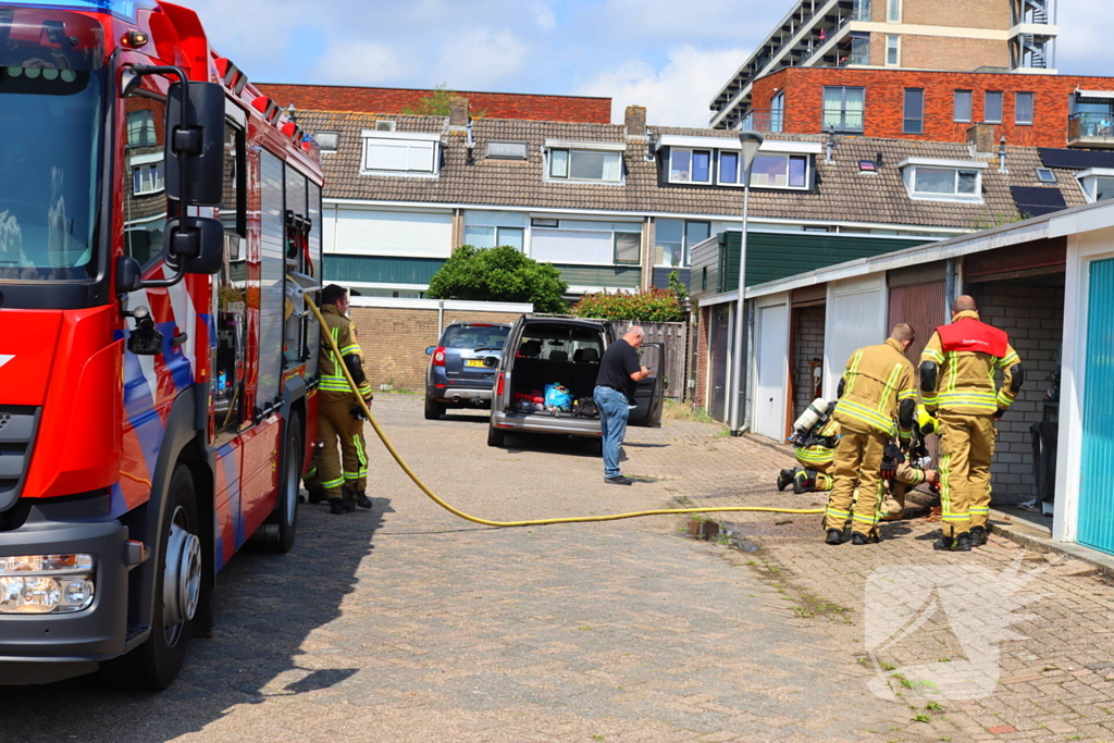 Brand in garage door laswerkzaamheden