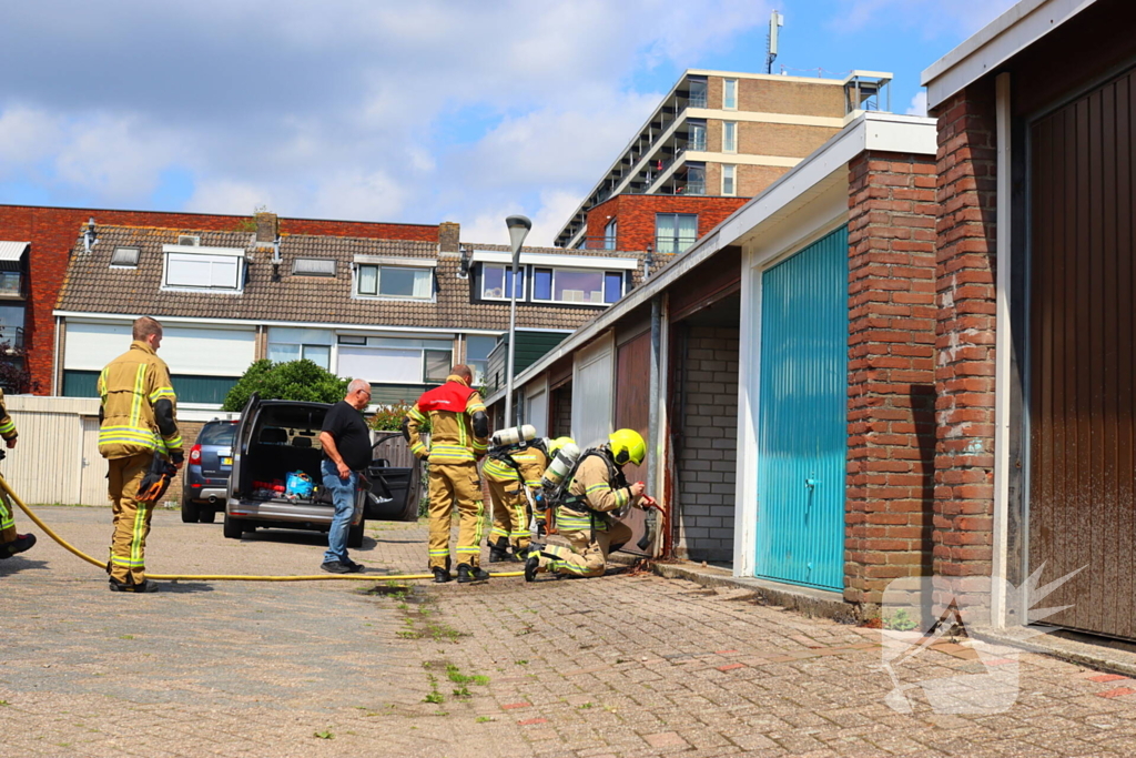 Brand in garage door laswerkzaamheden