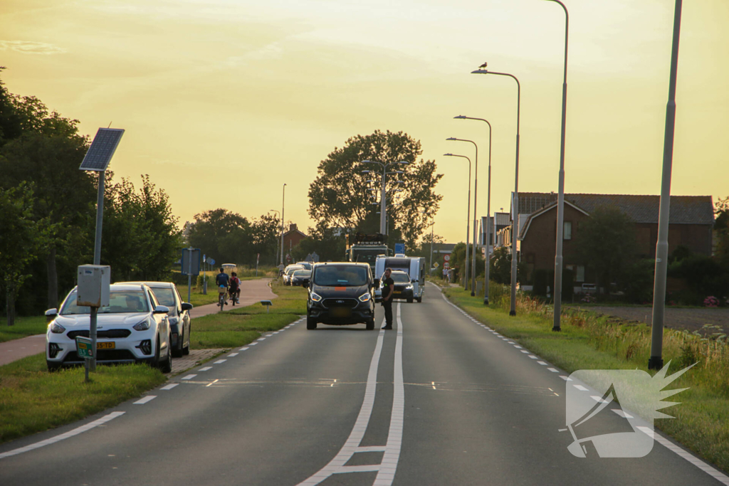 Fietser geschept door personenauto