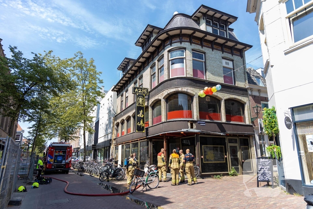 Brandende bouwmaterialen in binnenstad