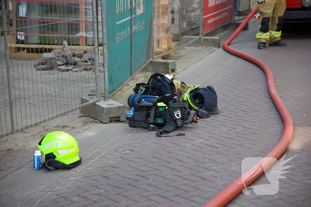 Brandende bouwmaterialen in binnenstad