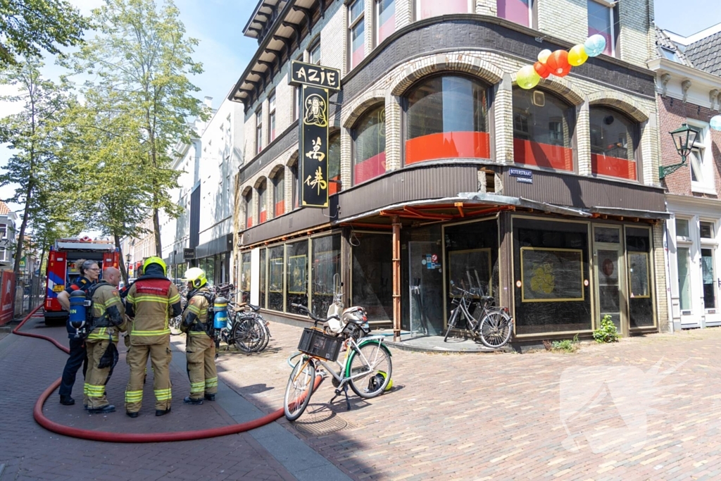 Brandende bouwmaterialen in binnenstad