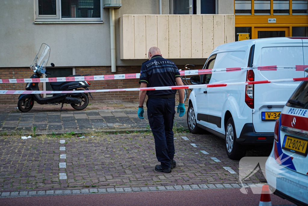 Aanhouding bij inval en onderzoek naar incident bij flat