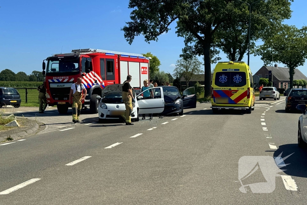 Schade na botsing op kruising