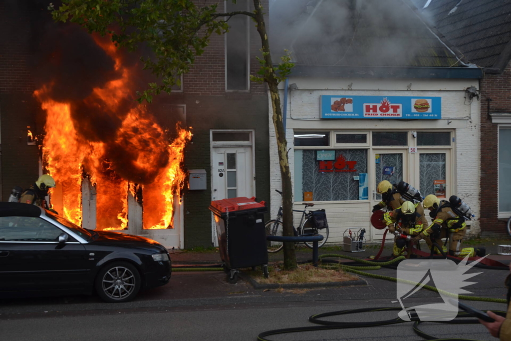 Grote uitslaande brand in pizzeria