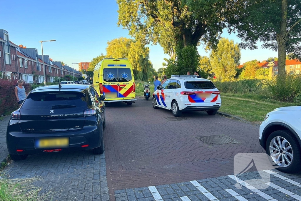 Persoon op scooter onderuit