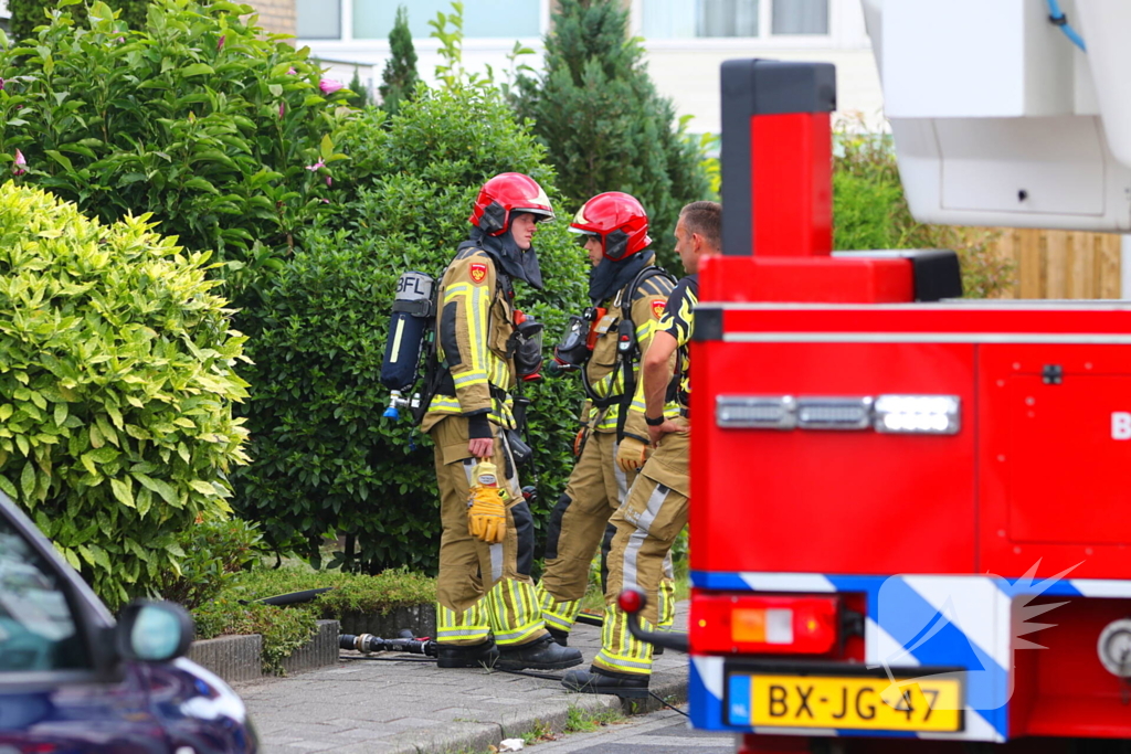 Woning vol rook door brand