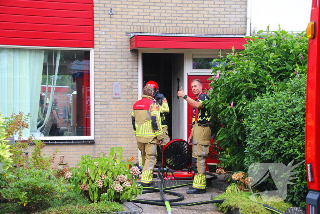 Woning vol rook door brand