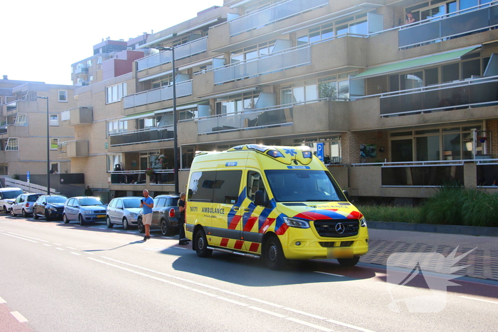 Bakfietser botst tegen openstaand portier