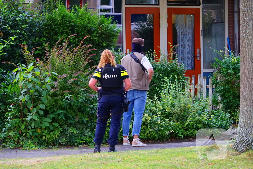 Politie valt woning binnen na schietpartij, verdachte aangehouden