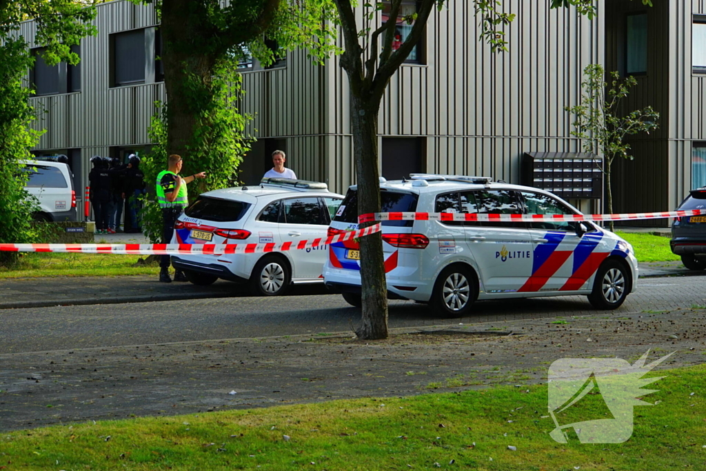 Politie valt woning binnen na schietpartij, verdachte aangehouden