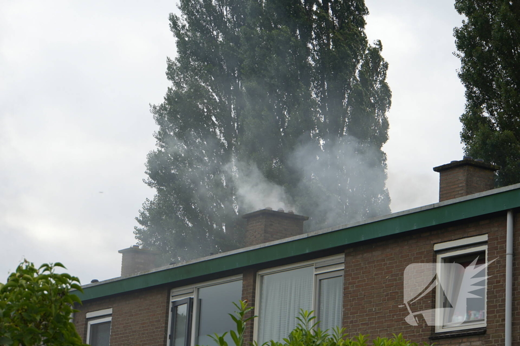 Uitslaande woningbrand door wasmachine