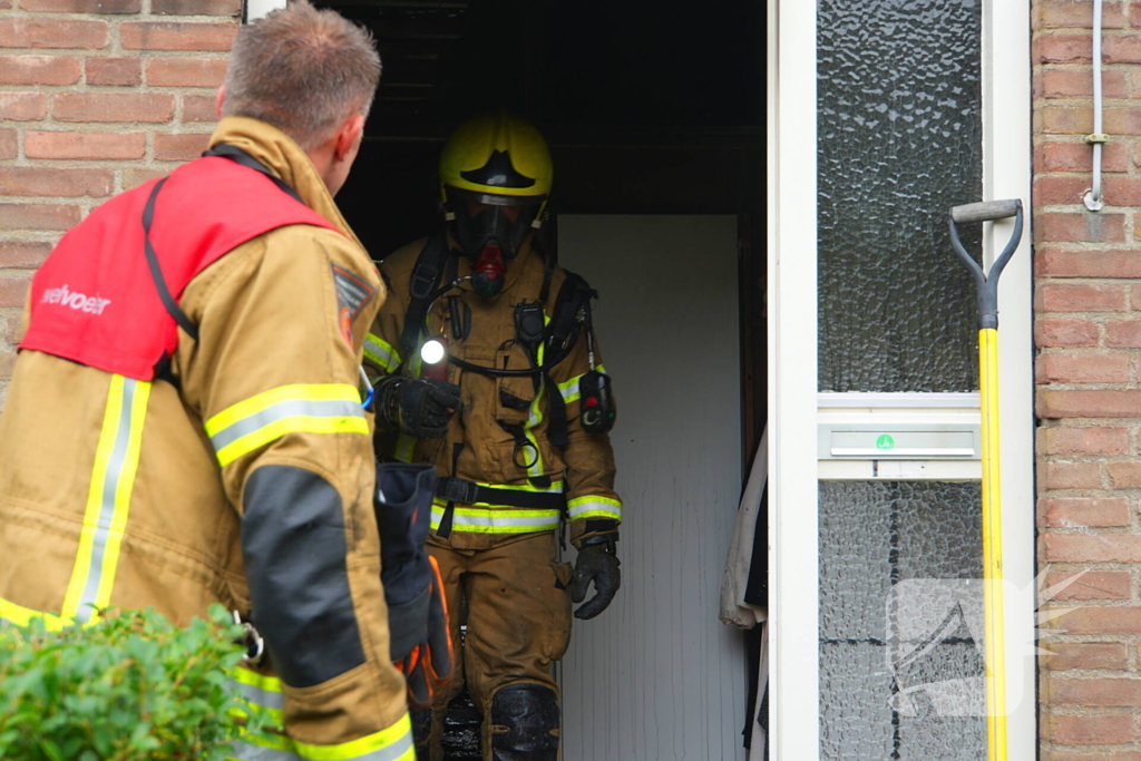 Uitslaande woningbrand door wasmachine