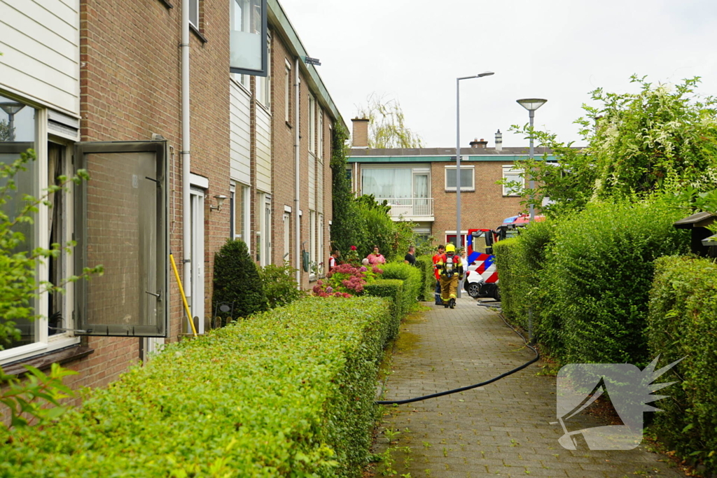 Uitslaande woningbrand door wasmachine