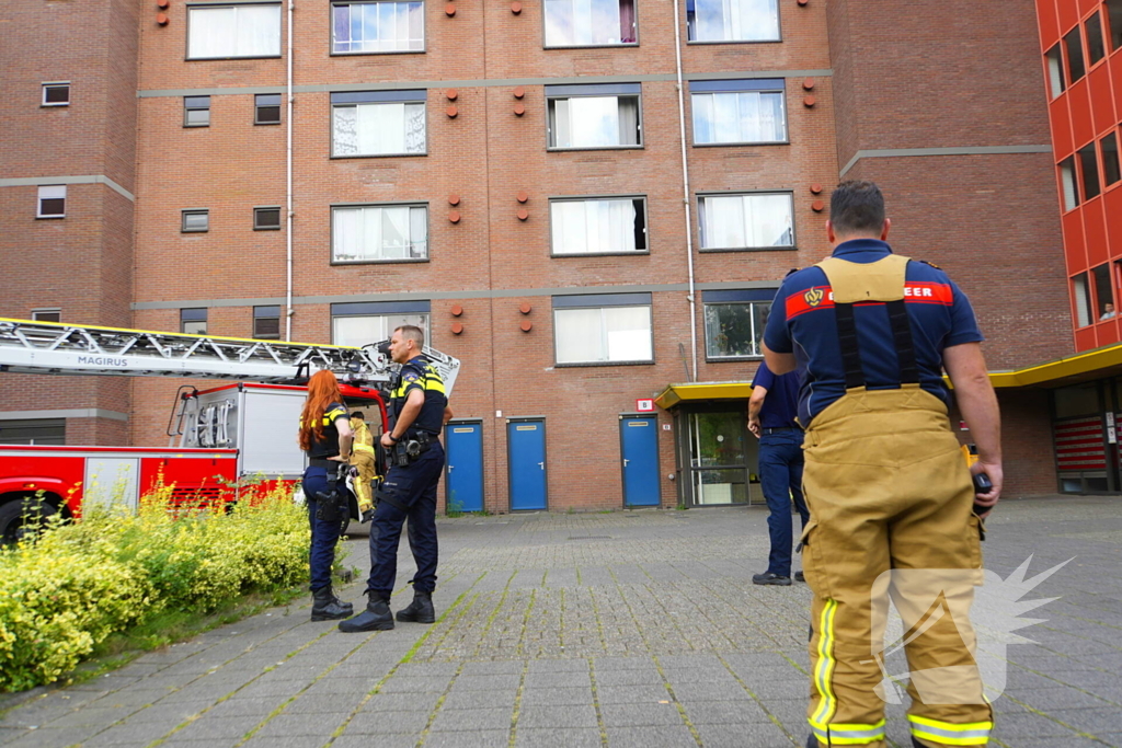 Rookontwikkeling op vijfde verdieping door keukenbrand