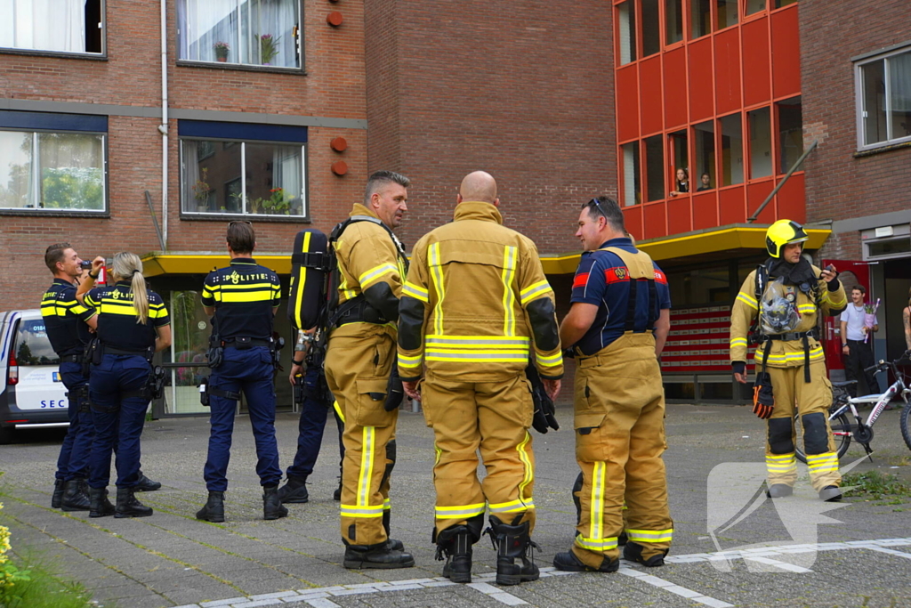 Rookontwikkeling op vijfde verdieping door keukenbrand