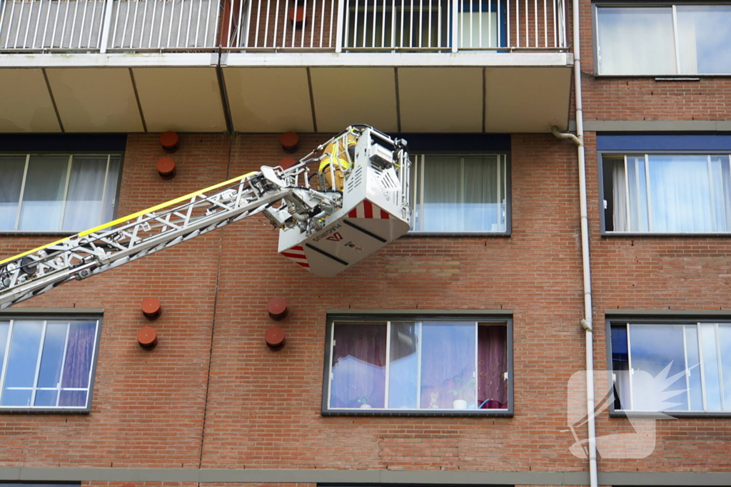 Rookontwikkeling op vijfde verdieping door keukenbrand