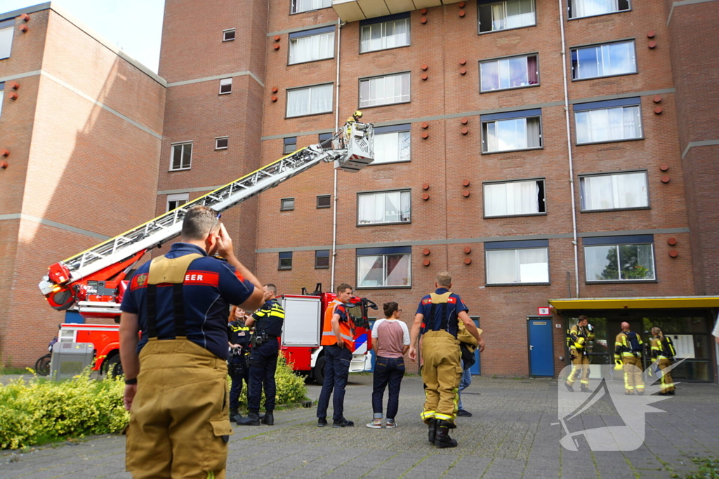 Rookontwikkeling op vijfde verdieping door keukenbrand