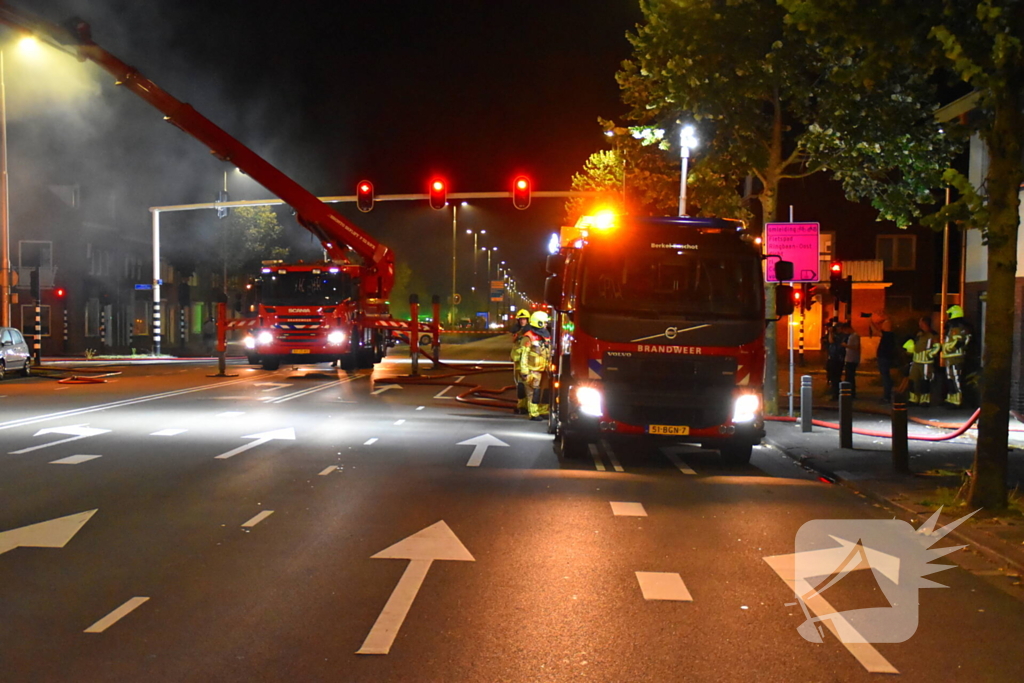 Forse rookontwikkeling bij uitslaande brand bij leegstaand pand