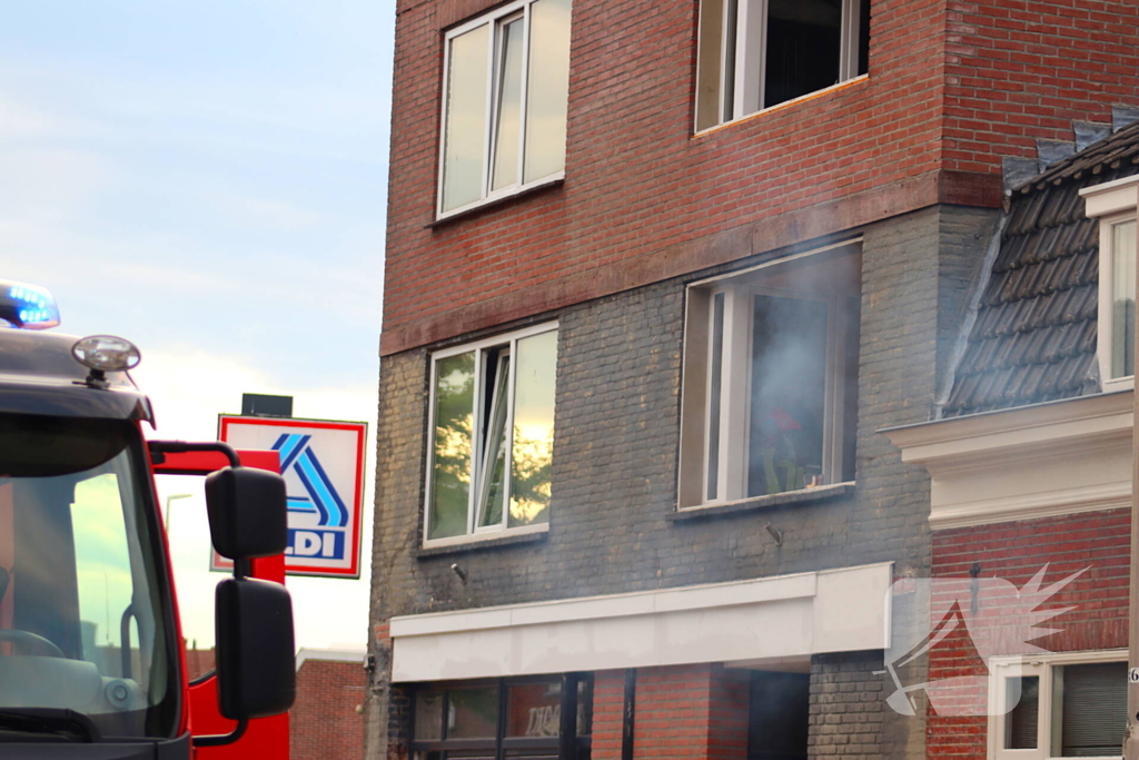 Barbecue op balkon aangezien als brand