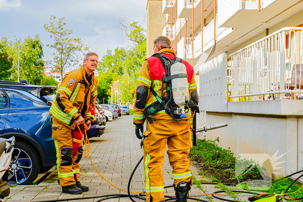 Brand in keuken in flatwoning snel onder controle