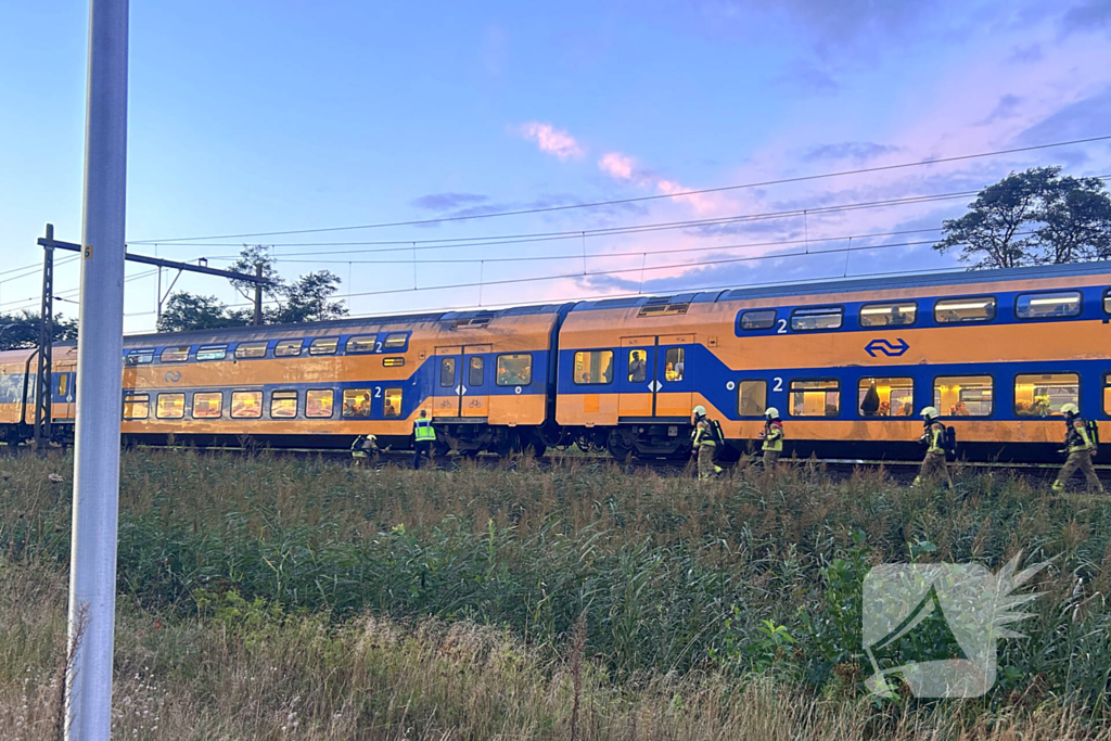 Rookontwikkeling onder trein door vastgelopen remmen