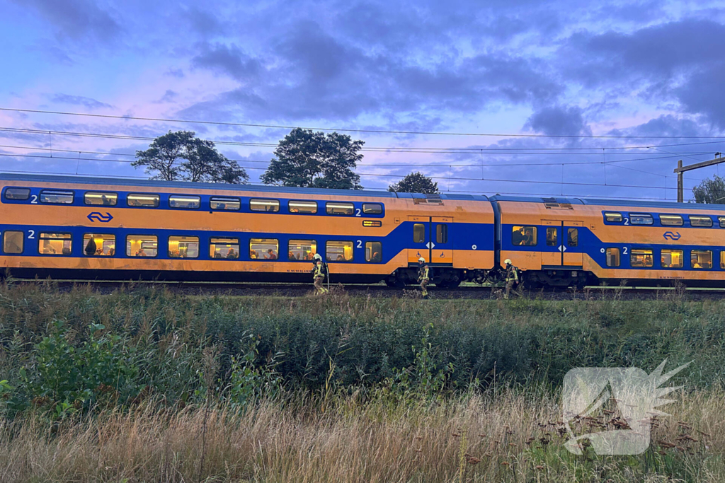 Rookontwikkeling onder trein door vastgelopen remmen