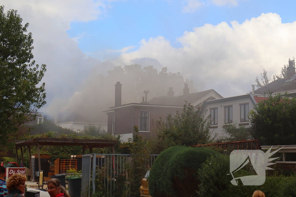 Grote rookontwikkeling bij woningbrand