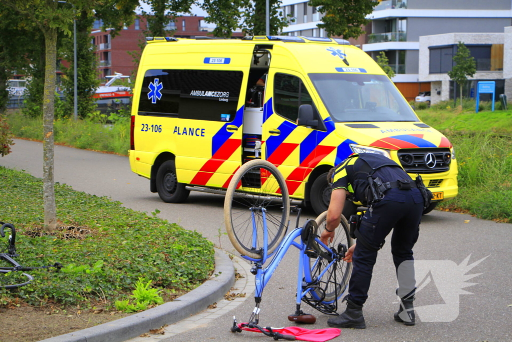 Wielrenner en fietser botsen op elkaar