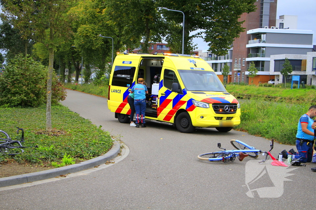 Wielrenner en fietser botsen op elkaar