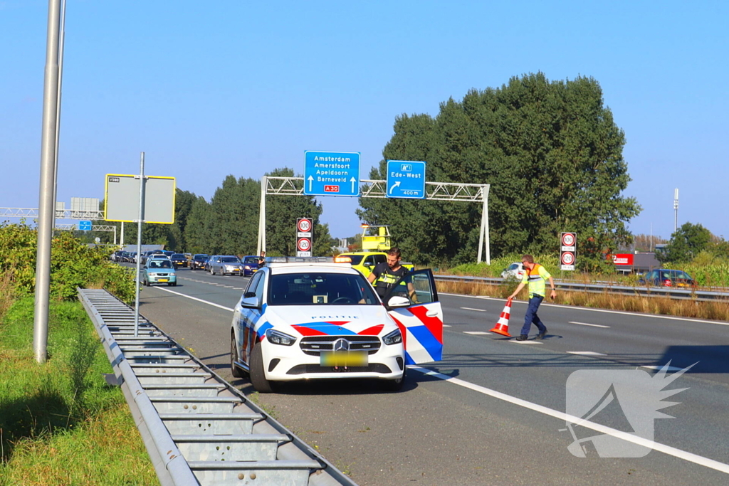 Schade bij kop-staart botsing op snelweg