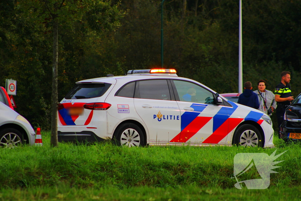 Scooterrijder en automobilist in botsing