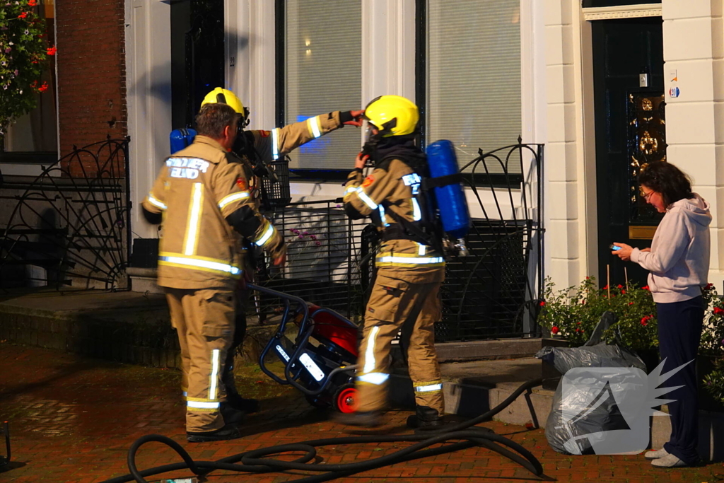 Brand in winkelpand snel onder controle