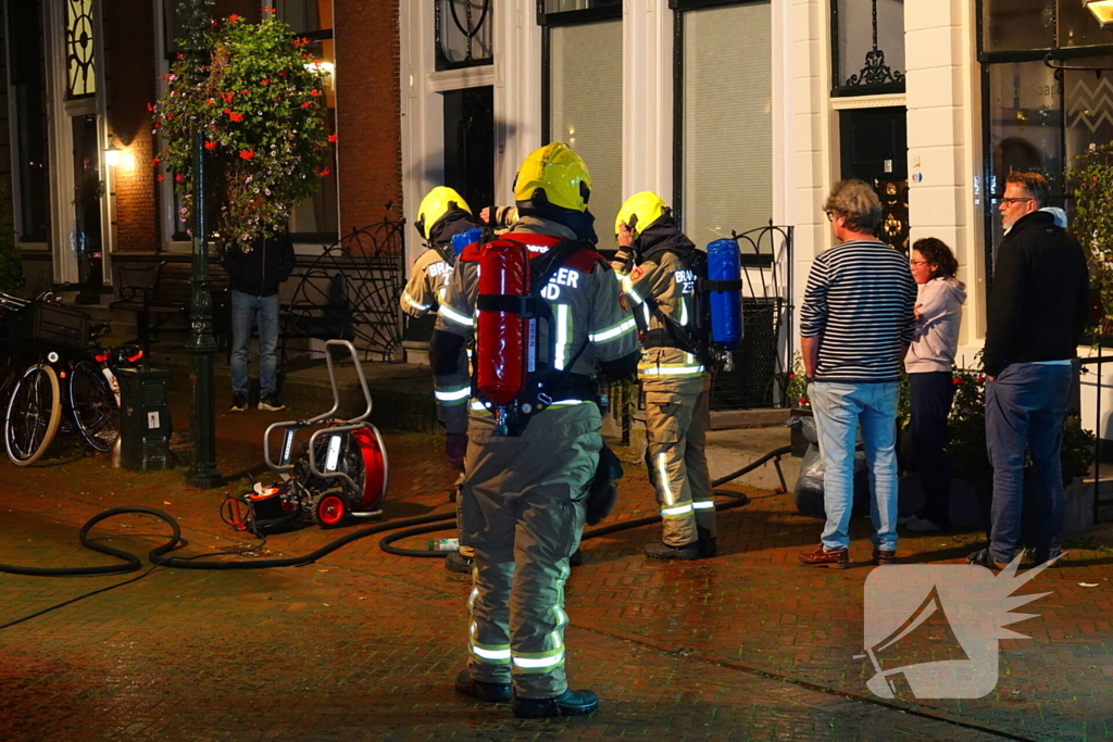 Brand in winkelpand snel onder controle