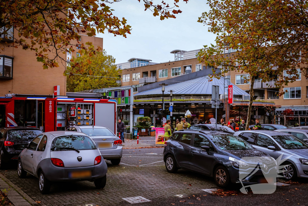 Persoon bekneld in auto