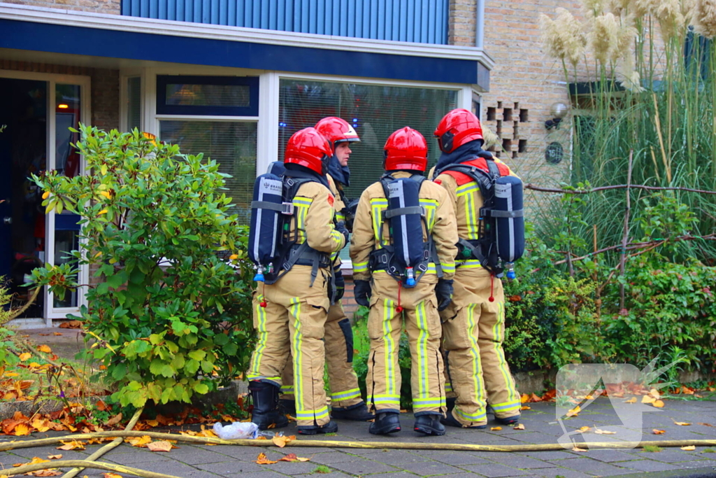 Flinke rookontwikkeling door brand in woning