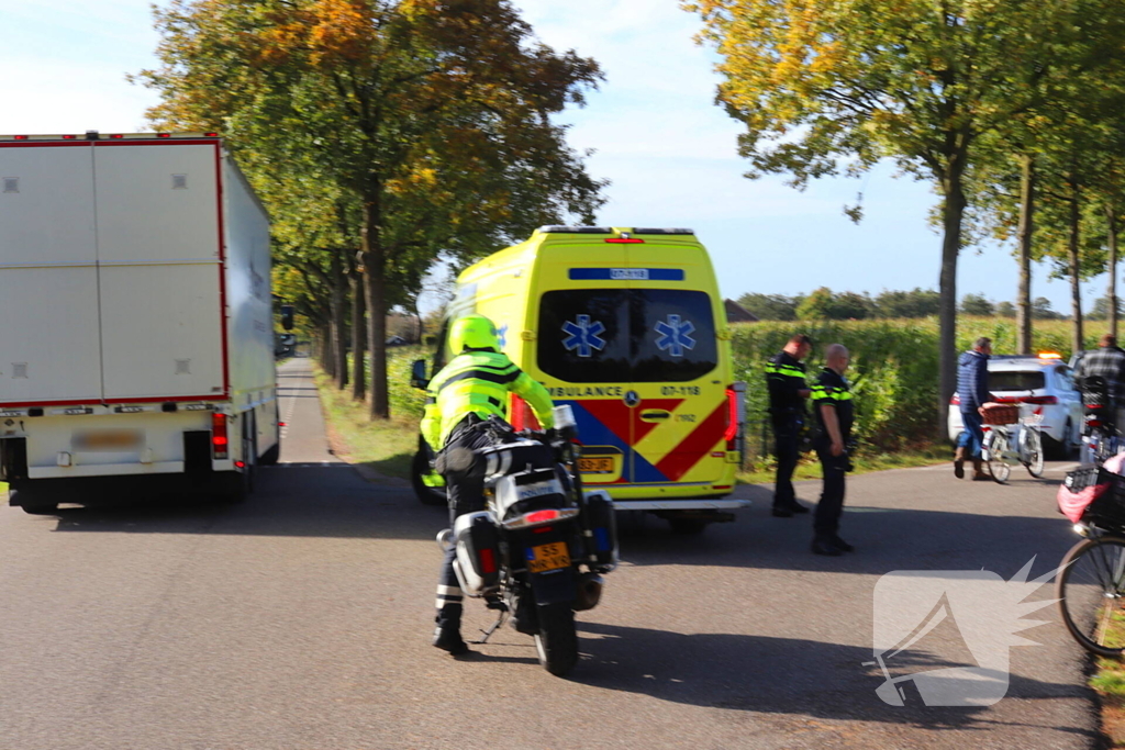 Twee fietsers klappen op elkaar