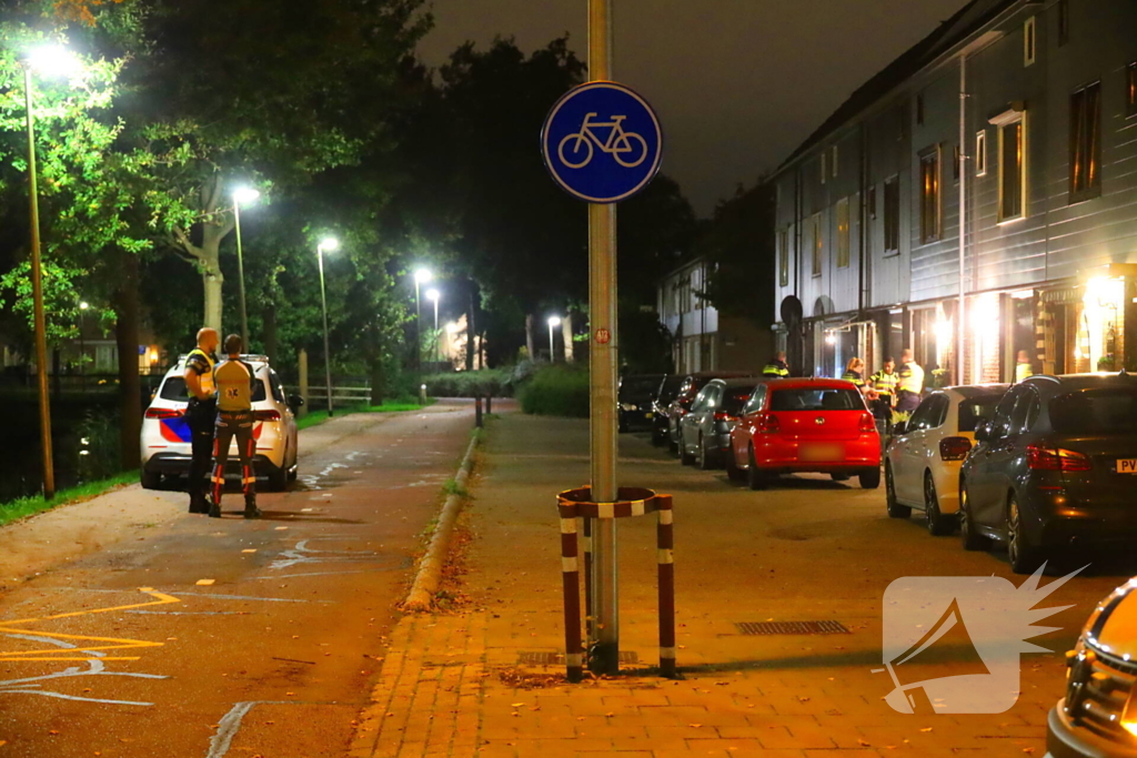 Gat in voordeur door explosie