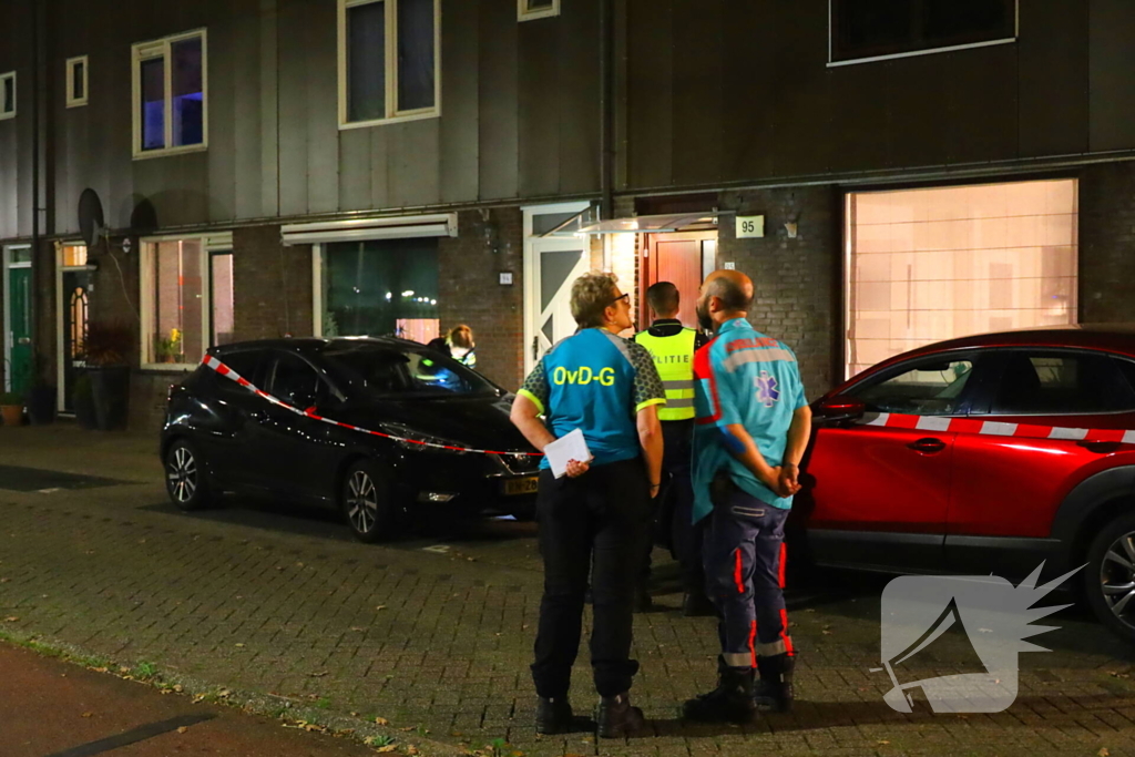 Gat in voordeur door explosie