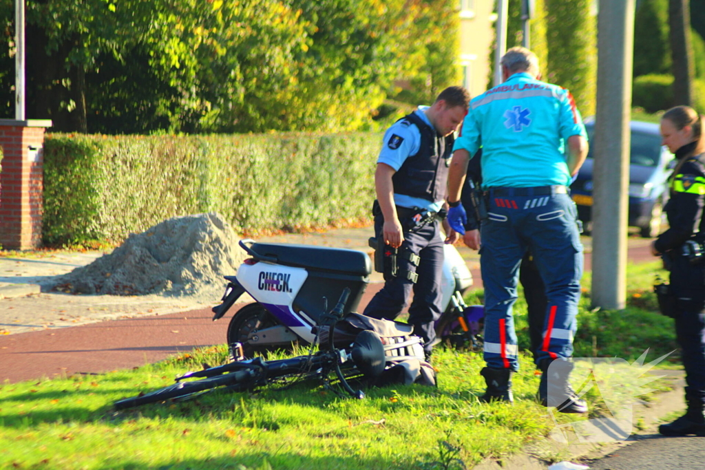 Fietser gewond bij botsing met auto